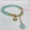 Aqua & Golden Beaded Bracelet with Flower Charm and Pearl for Women