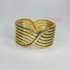 Golden Polished Intertwined Kada Bracelet For Women
