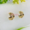 Golden Polished Multi-Band Half-Hoop Stud Earrings with Stones