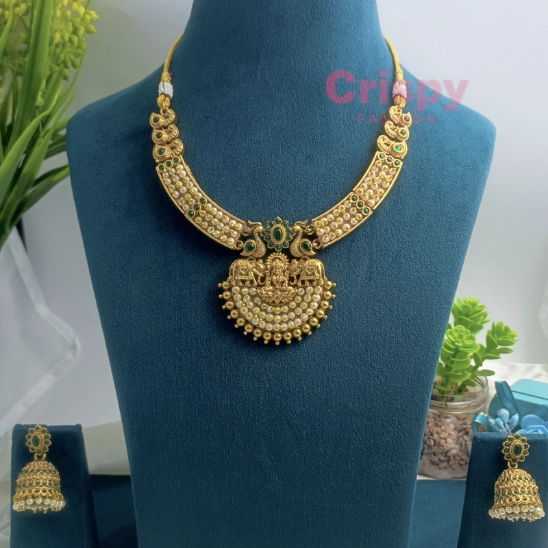 Traditional Golden Polished Goddess Lakshmi Temple Choker Necklace Set with Peacock Motifs and Jhumka Earrings