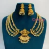 Traditional Golden Polished Multi-Layer Pearl Necklace Set with Goddess Lakshmi Pendant and Jhumka Earrings