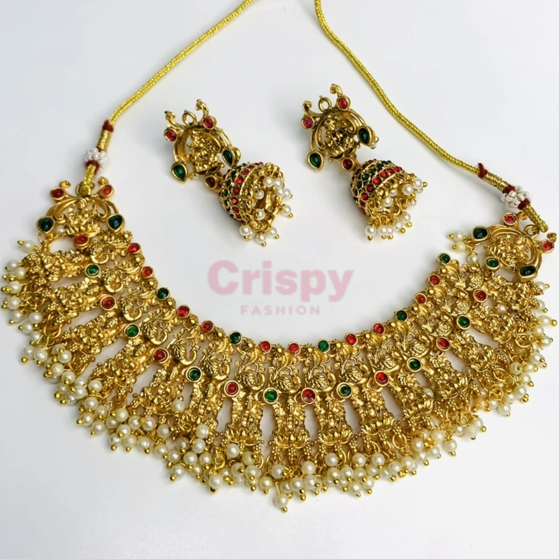 Traditional Heavy Golden Polished Choker Necklace Set with Lakshmi Motifs and Jhumka Earrings