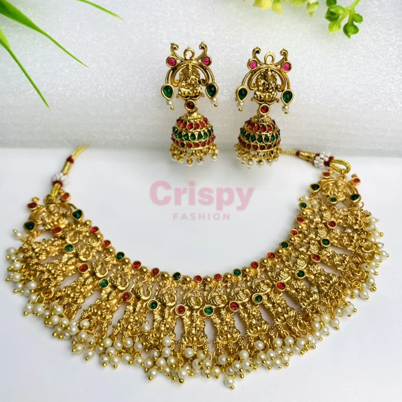 Traditional Heavy Golden Polished Choker Necklace Set with Lakshmi Motifs and Jhumka Earrings