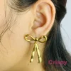 Sculptural Golden Bow Dangler Earrings