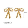 Sculptural Golden Bow Dangler Earrings